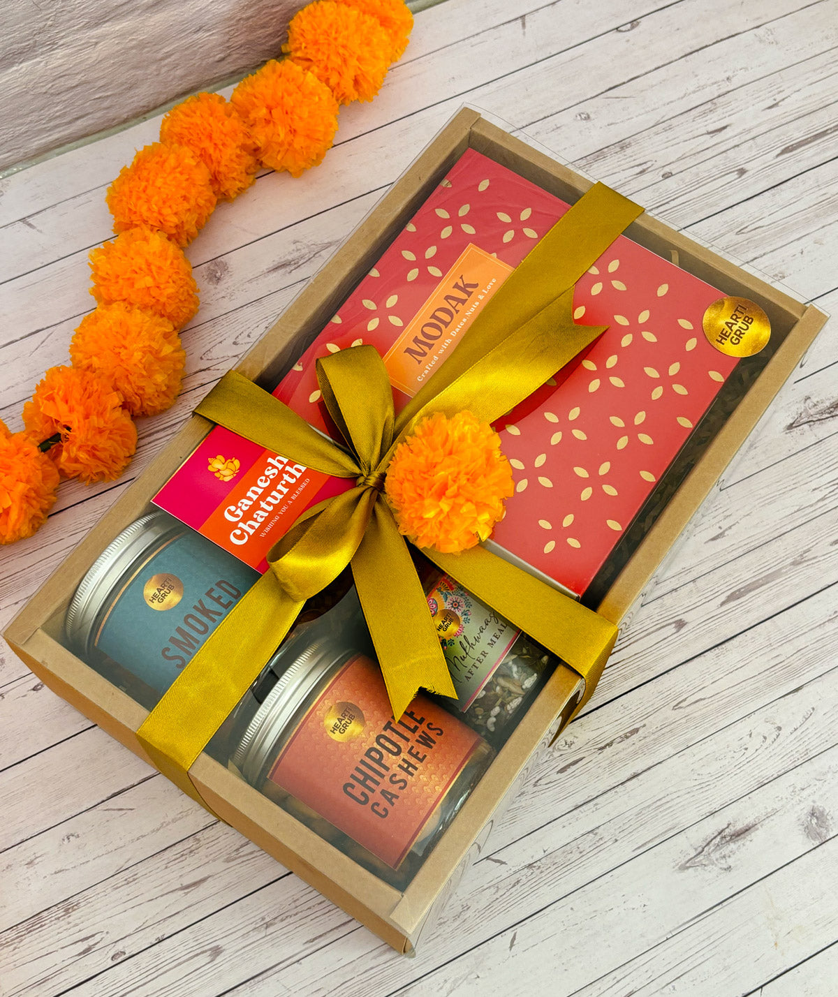 Gift set with Modak, Ganesh Chaturthi items.Ganesh Chaturthi. Gifting. Made in Small Batches. Deliciously Decadent. Vegan Gluten Free Refined Sugar Free. Delicious Modak. Nuts. Delivery throughout U.A.E.