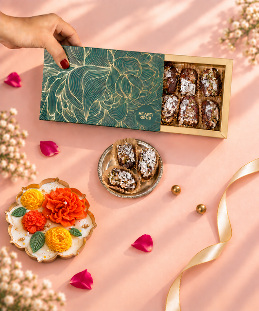 A luxury gift box of Indian sweets. Paan khajur Dates.Jumbo Medjool dates. Made in UAE. Indian Wedding Gifts, Corporate Gifting. Gifts for Diwalii, Holi, GAnpati, Ganesh Chaturthi and Indian Festivals. Made by Heartigrub.  No preservatives, no colors, no chemicals.