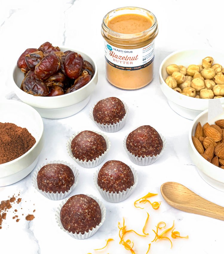 PEANUT BUTTER BOMBS. VEGAB. DATE BALLS. BLISS BALLS. CHOCOLATE BALLS. HAZELNUT ENERGY BALLS. MADE IN UAE. HEARTIGRUB