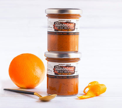 CACAO HAZELNUT BUTTER by HEARTIGRUB. RAW CACAO, TURKISH HAZELNUTS, HINT OF HONEY. THE BETTER HAZELNUT BUTTER WITH ORANGE ZEST By HEARTIGRUB. Made in Dubai, UAE. Nut Butter s and Spreads