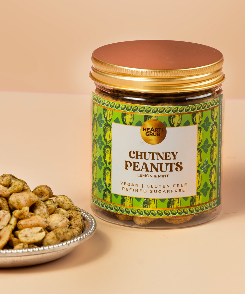 Jar of chutney peanuts with a label on a beige background. Bespoke Diwali gift. Thoughtful gifts. No Nasties. Clean Ingredients. UAE. Dubai. Abu Dhabi. Sharjah. Delivery throughout UAE. Nuts. Nut Butters. HeartiGrub