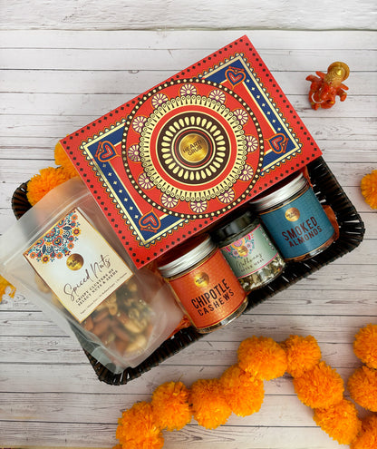Gift set with Modak, Ganesh Chaturthi items. Ganesh Chaturthi. Gifting. Made in Small Batches. Deliciously Decadent. Vegan Gluten Free Refined Sugar Free. Delicious Modak. Nuts. Delivery throughout U.A.E. HeartiGrub