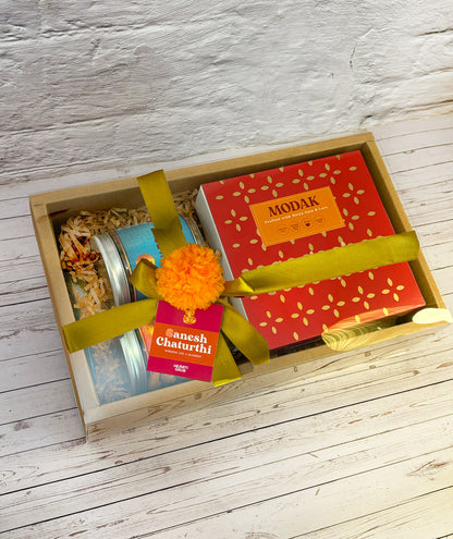 Gift set with Modak, Ganesh Chaturthi items. Ganesh Chaturthi. Gifting. Made in Small Batches. Deliciously Decadent. Vegan Gluten Free Refined Sugar Free. Delicious Modak. Nuts. Delivery throughout U.A.E. HeartiGrub