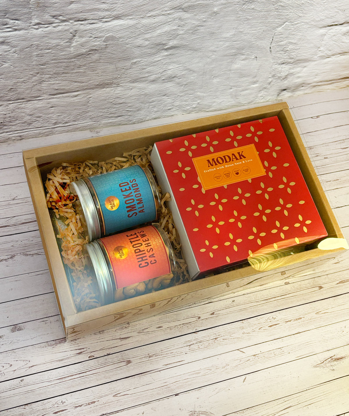Gift set with Modak, Ganesh Chaturthi items. Ganesh Chaturthi. Gifting. Made in Small Batches. Deliciously Decadent. Vegan Gluten Free Refined Sugar Free. Delicious Modak. Nuts. Delivery throughout U.A.E. HeartiGrub