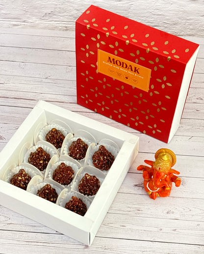 Gift set with Modaks, Ganesh Chaturthi items. Ganesh Chaturthi. Gifting. Made in Small Batches. Deliciously Decadent. Vegan Gluten Free Refined Sugar Free. Delicious Modak. Nuts. Delivery throughout U.A.E. HeartiGrub