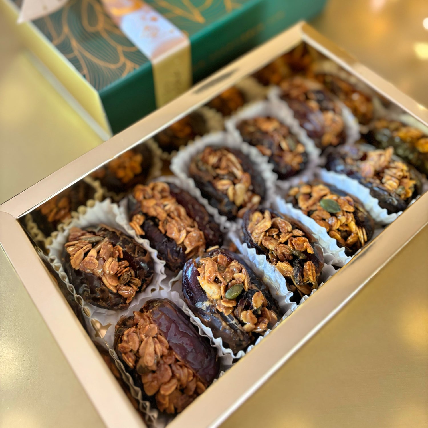Jumbo Medjool dates stuffed with creamy almond butter and crunchy granola. Luxury Thoughtful Gifting. Delivery throughout UAE. Wholesome snack. Ramadan, gifting, or everyday enjoyment. Made by HeartiGrub