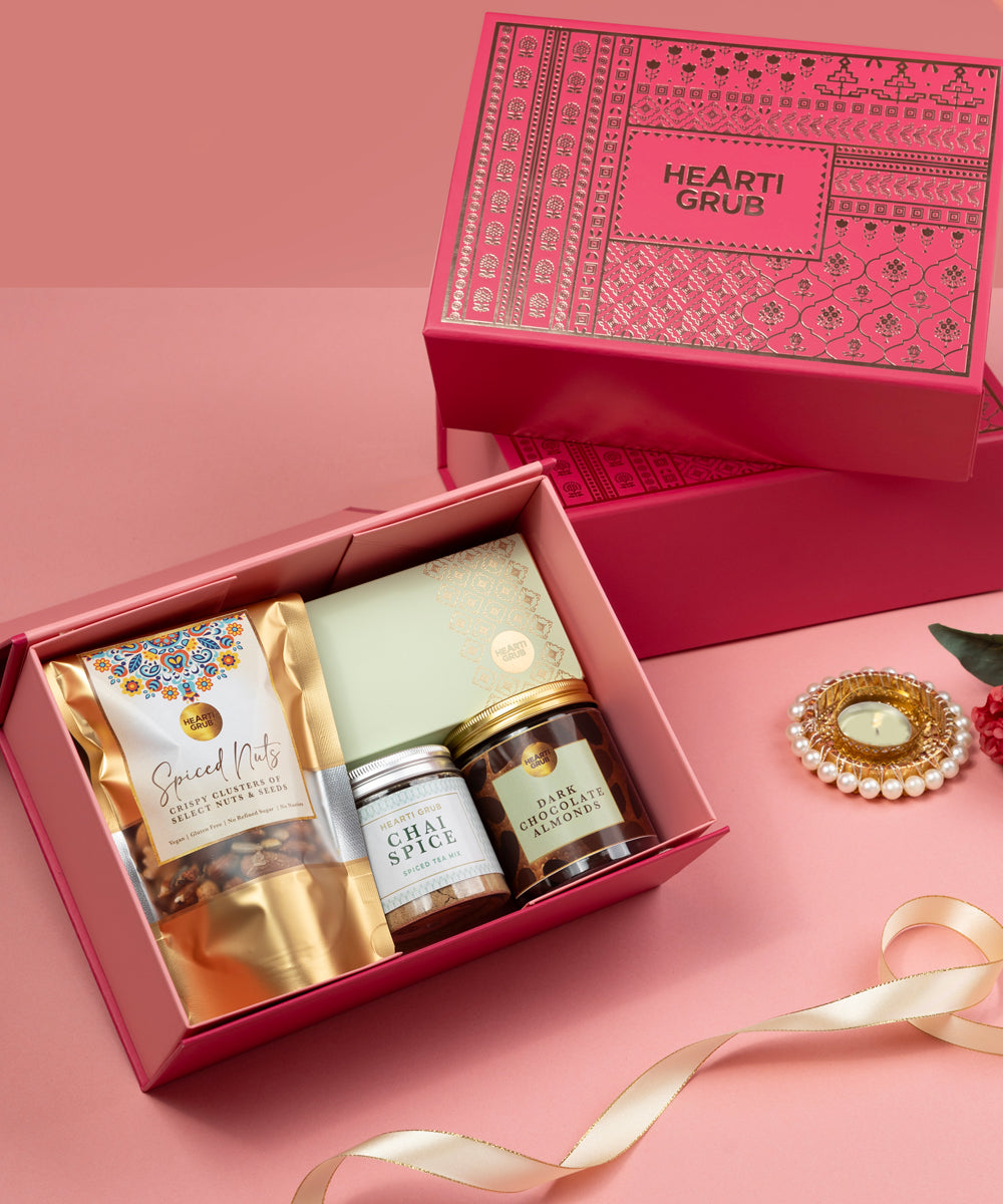 1 x Bag of Spiced Nuts
1 x Jar of Dark Chocolate Almonds
1 x Jar of Chai Spice Blend
1 x Box of Paan Khajur (5pcs)
Bespoke Diwali gift. Thoughtful gifts. No Nasties. Clean Ingredients. UAE. Dubai. Abu Dhabi. Sharjah. Delivery throughout UAE. Nuts. Nut Butters
