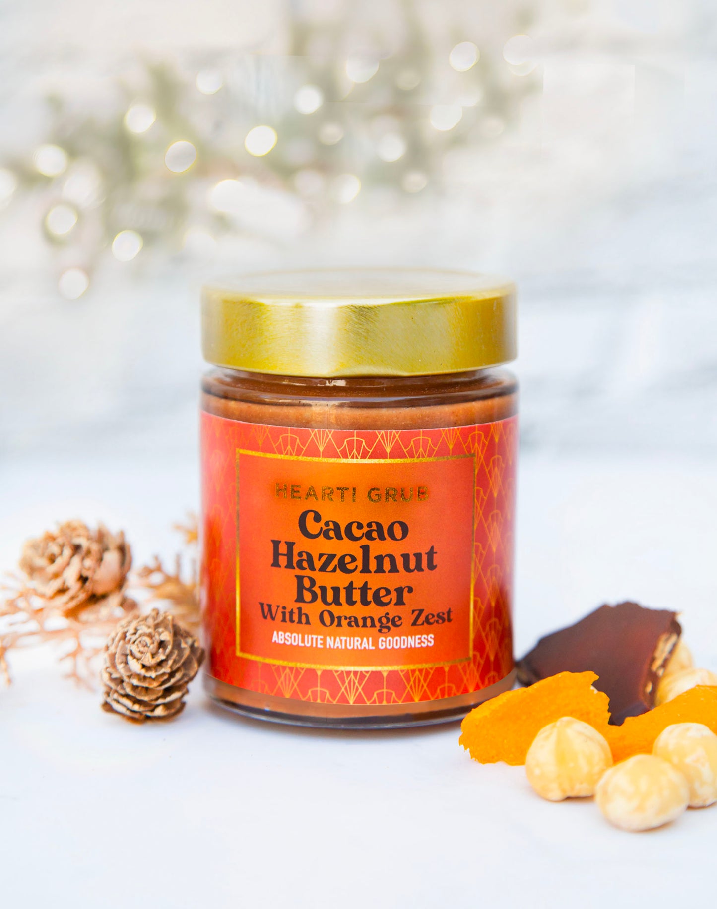CACAO HAZELNUT BUTTER by HEARTIGRUB. RAW CACAO, TURKISH HAZELNUTS, HINT OF HONEY. THE BETTER HAZELNUT BUTTER WITH ORANGE ZEST By HEARTIGRUB. Made in Dubai, UAE. Nut Butter s and Spreads. Gift Delivery in UAE